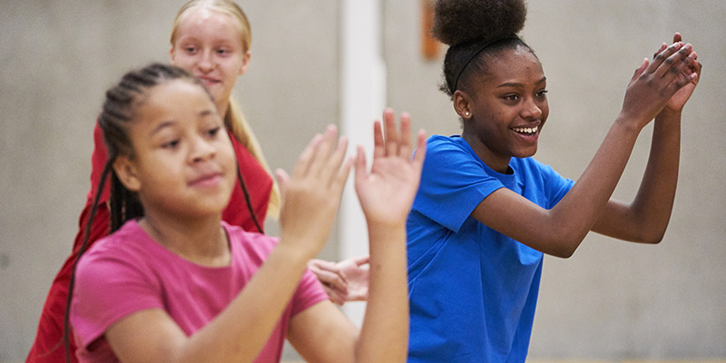 Young girls dance in PE class