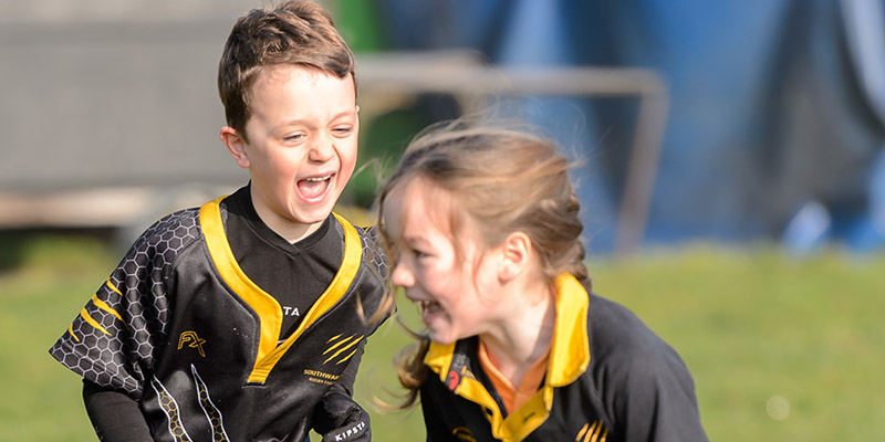 children playing rugby