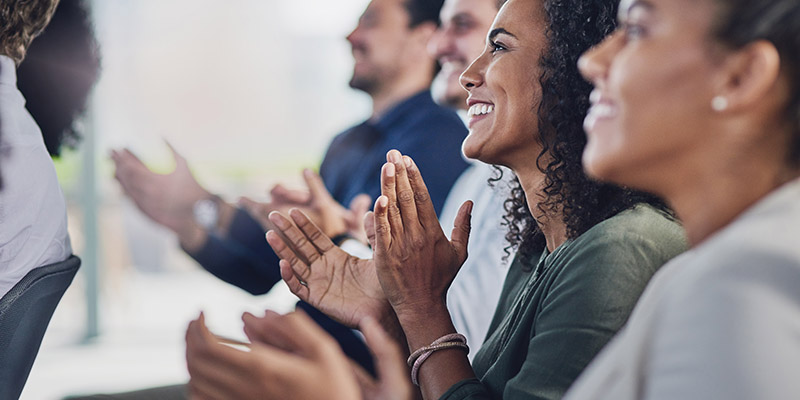 Cropped shot of a group of businesspeople applauding during a seminar in the conference room